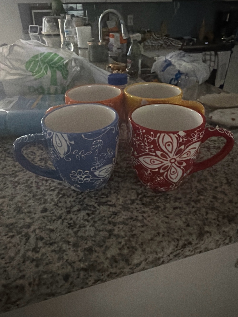Set of 4 Floral Pattern Ceramic Mugs - Blue, Red, Orange, Yellow
